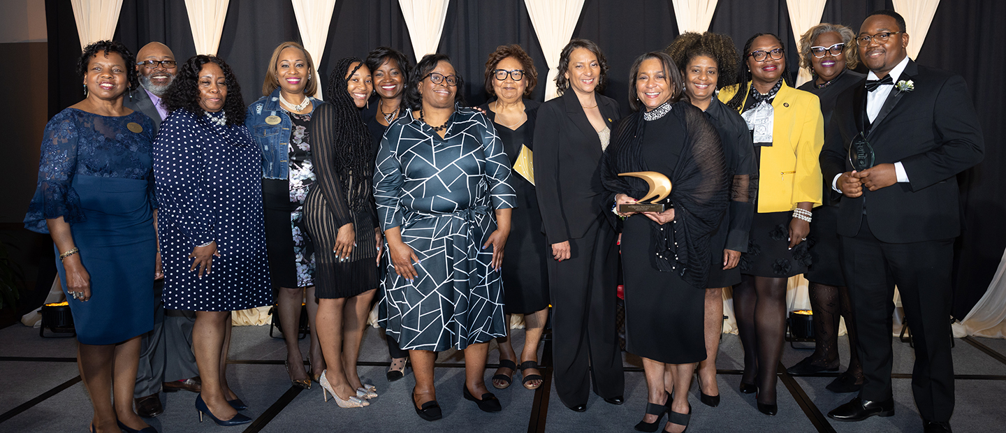 Black Alumni Chapter Banner A group photo at a Black Alumni Chapter event