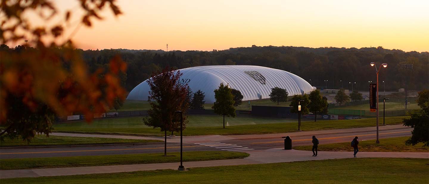The exterior of the white Oakland University athletic dome
