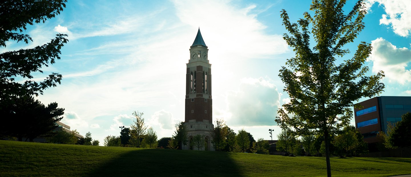 HowToApply.jpg Elliott Tower with the sun shining behind it