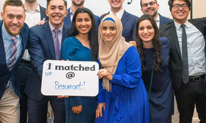 A group of OUWB alumni at match day