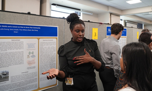 A student talks about her research poster