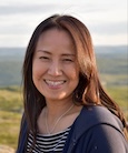 A headshot of Kuniko Nielsen outdoors