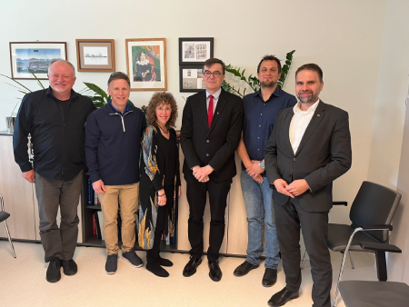 Ora and a group of leaders