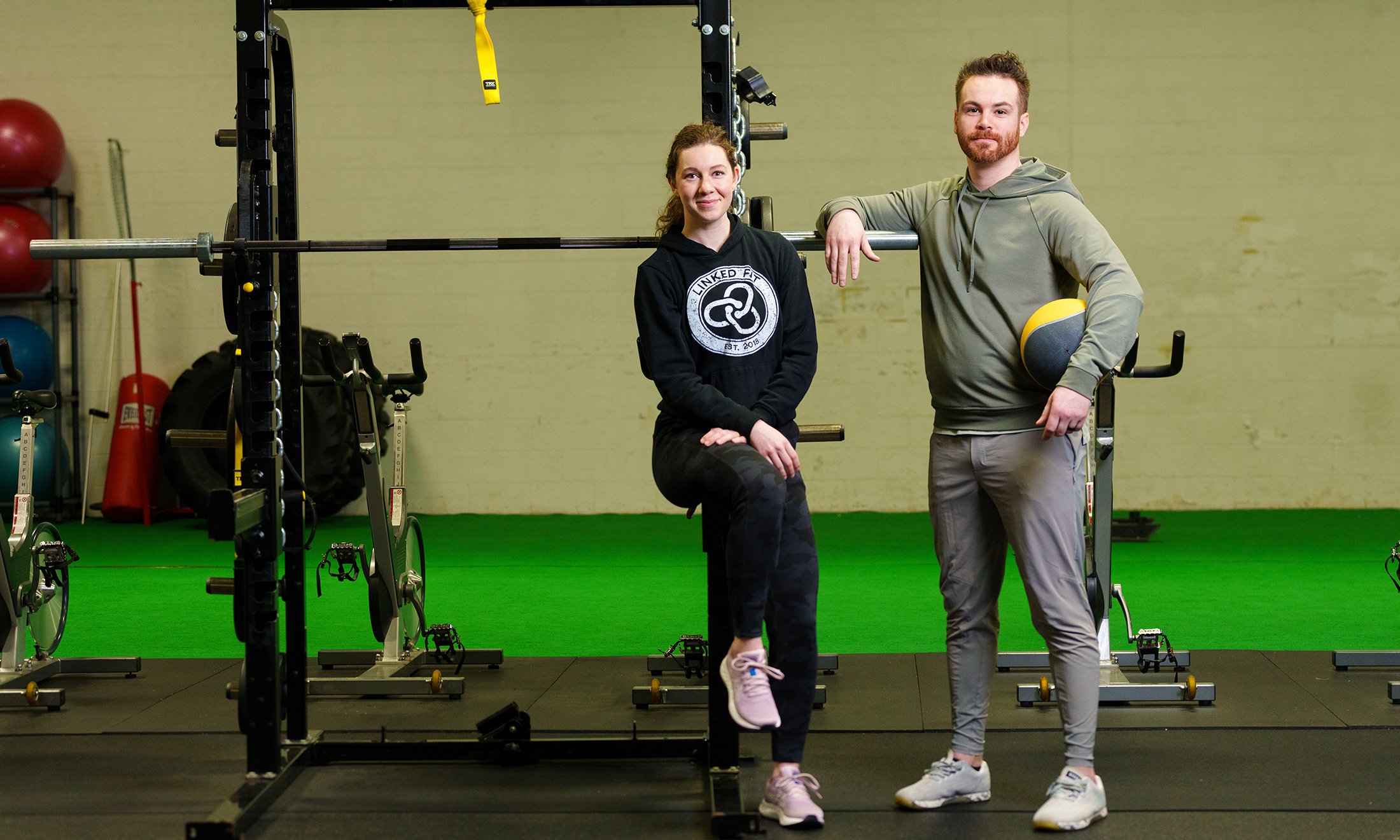 Two people in a gym