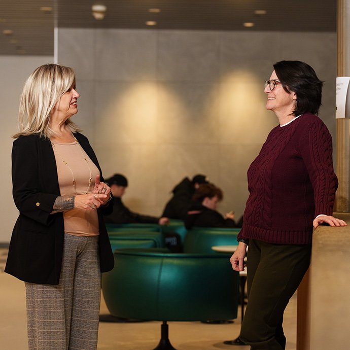 Two people talking