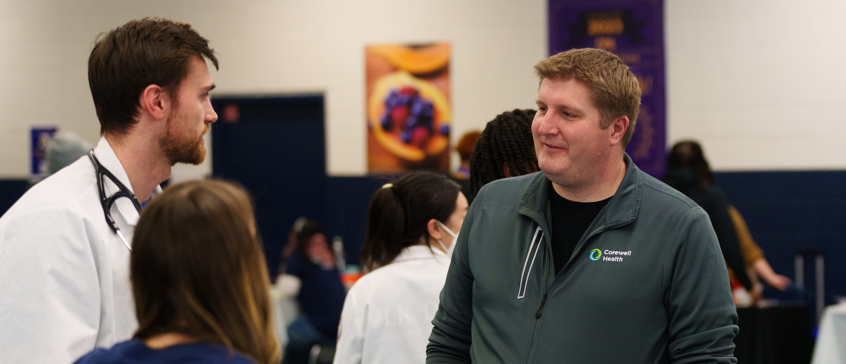 Clinical Faculty Banner An image of Dr. Felice talking with students