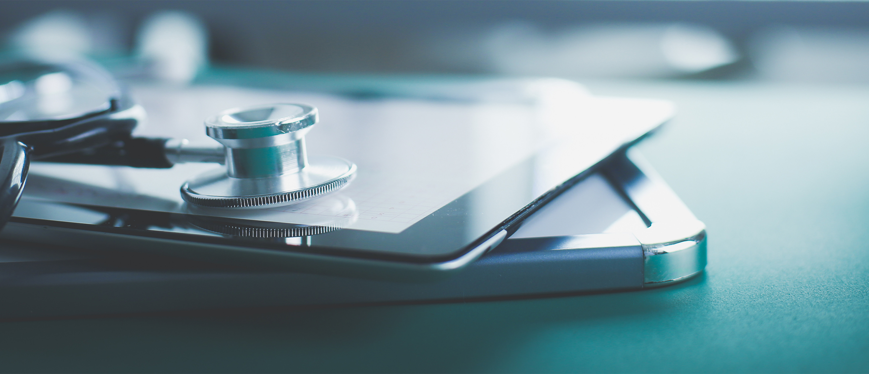 Embark - Global and Community Health Research Banner An image of a stethoscope on a table