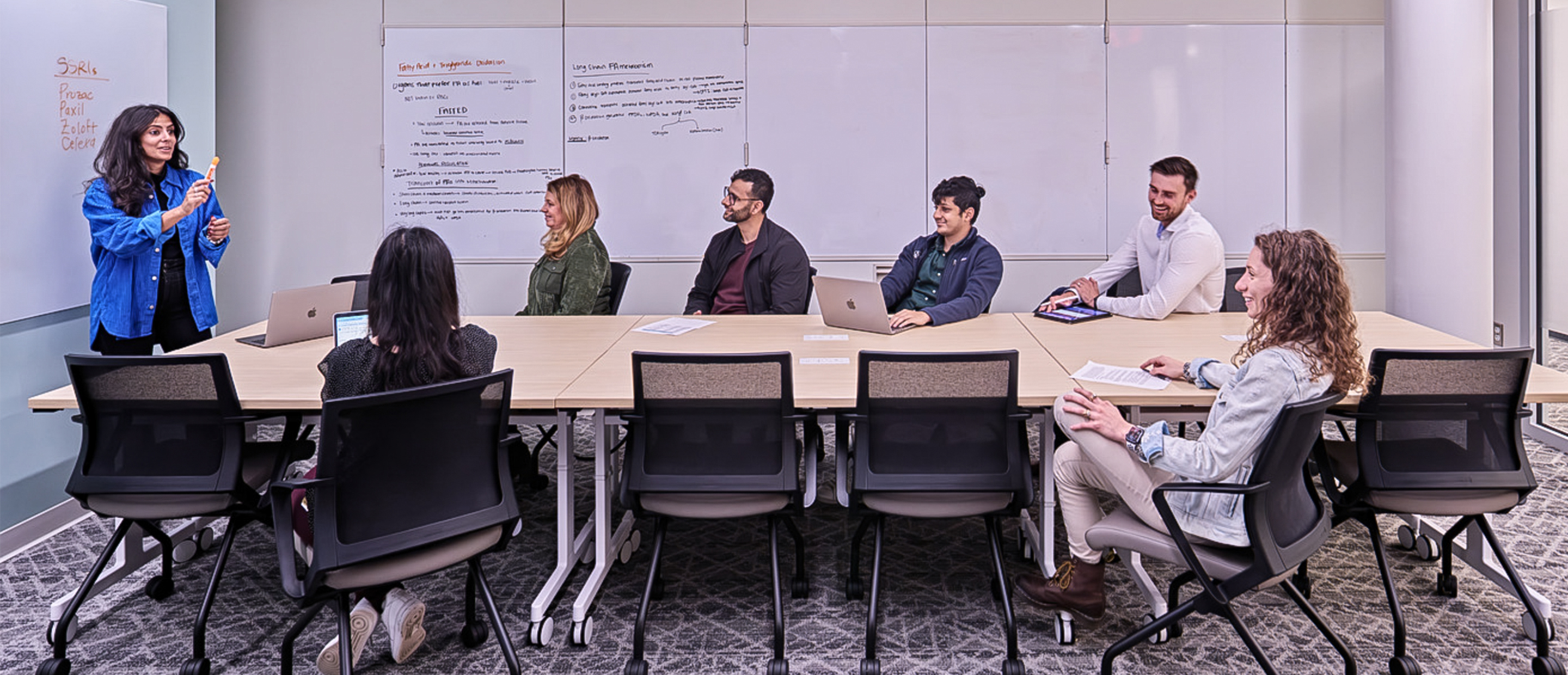 OUWB Spaces Banner An image of students in a conference room
