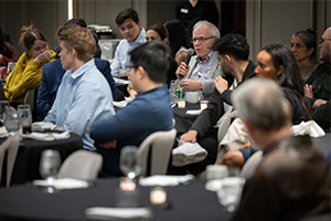 An image of an attendee asking a question