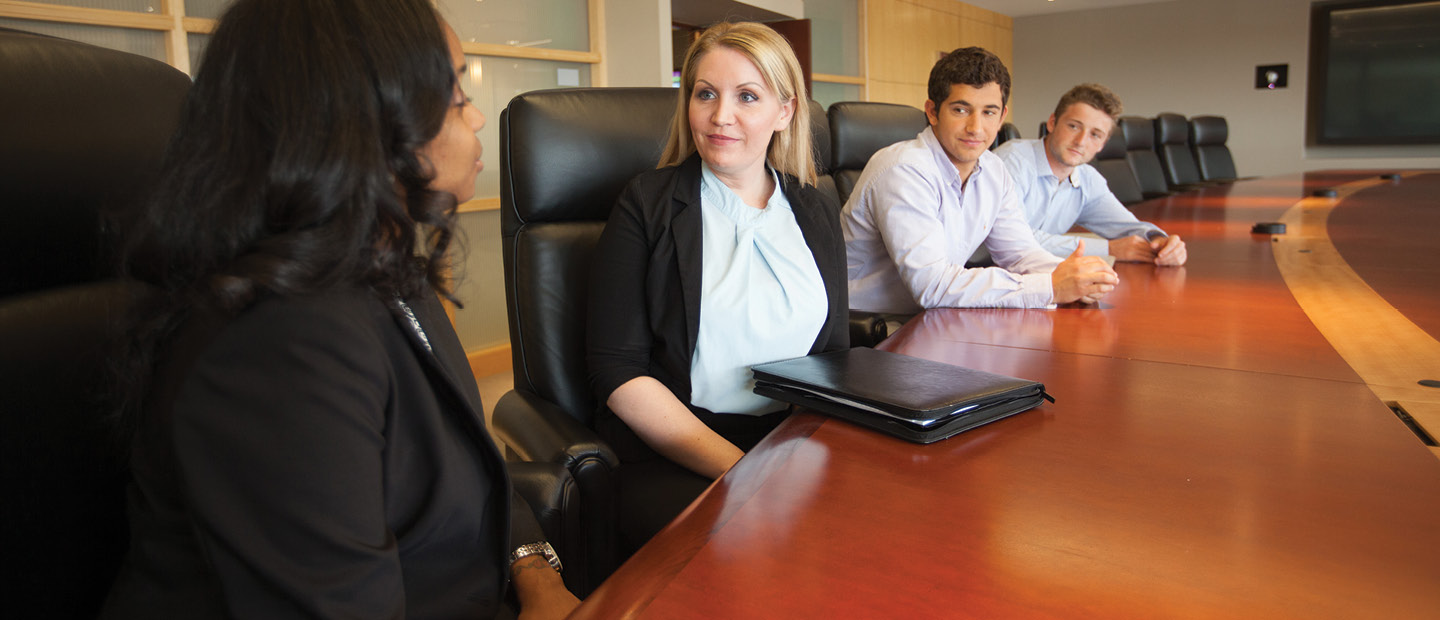 Is Law School Right for Me? Banner four adults seated in black chairs in a row