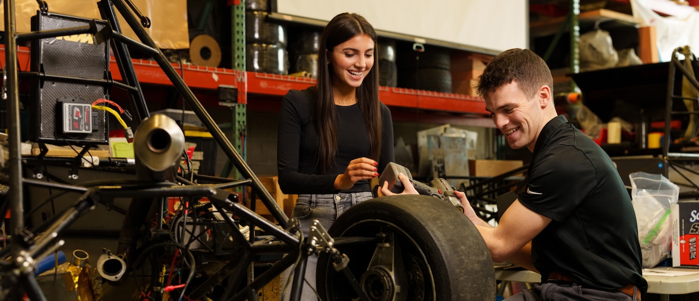 Student Leader Program Two students working in a mechanical lab.