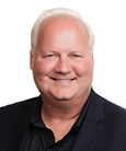 A headshot of Paul Fleck