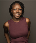 Denetria Gibson posing for a headshot