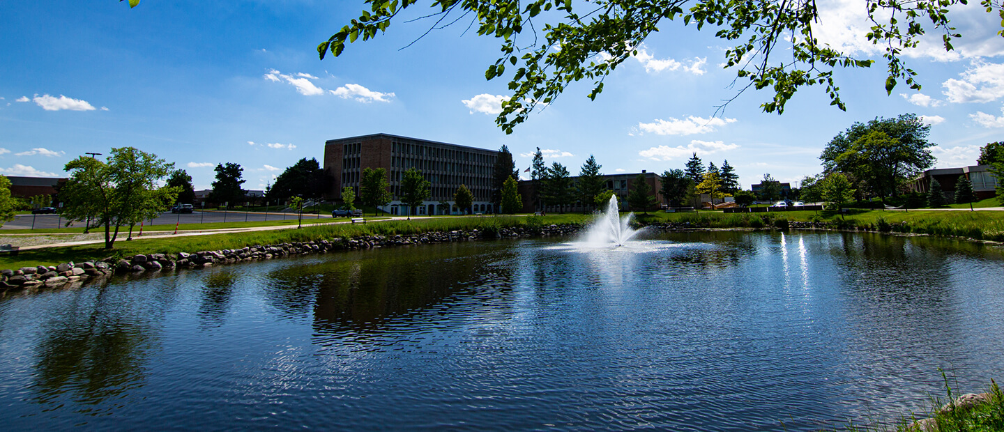 Why Summer Banner Bear Lake on Oakland University's campus in summer.