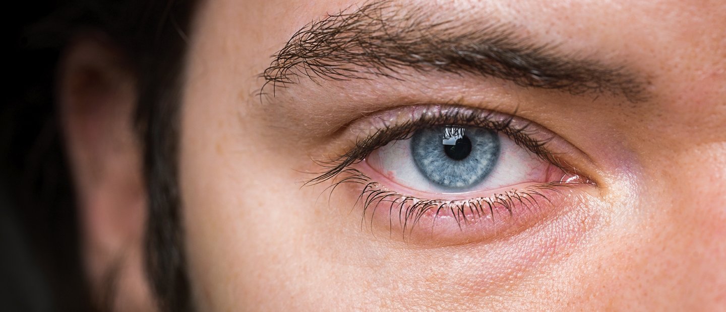 _0007_Continuing Education.jpg A very close up image of a blue eye with dark eye lashes.