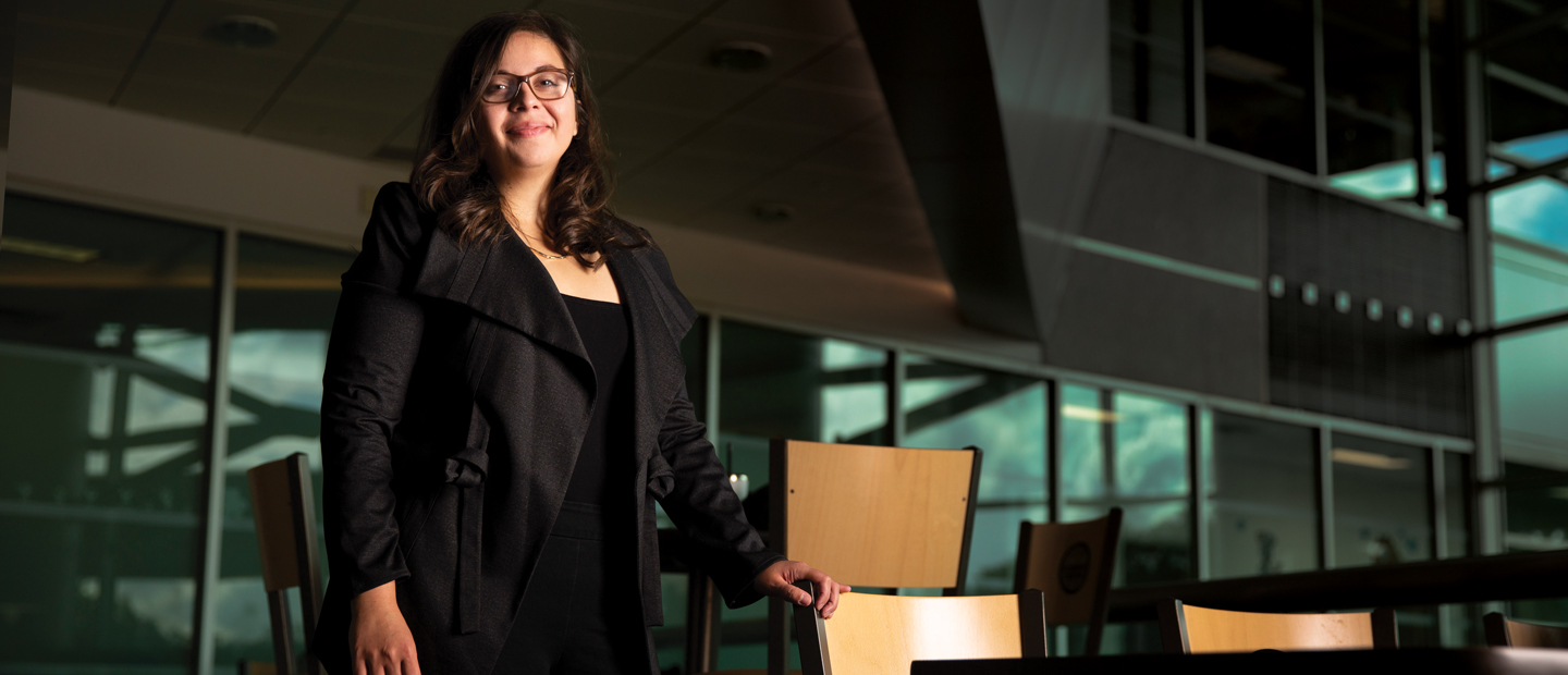 MOL_Banner2.jpg Image of a college aged girl standing and smiling at the camera