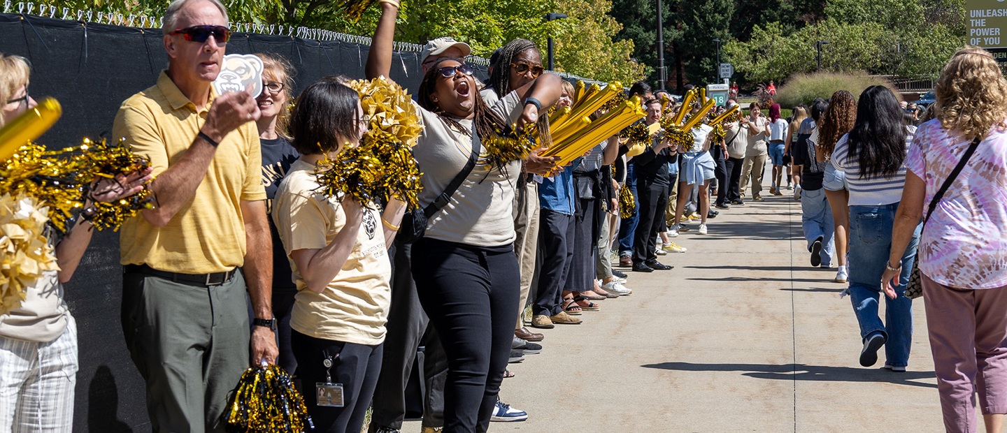 New Student Welcome A line of supporters cheering for new Oakland University Students